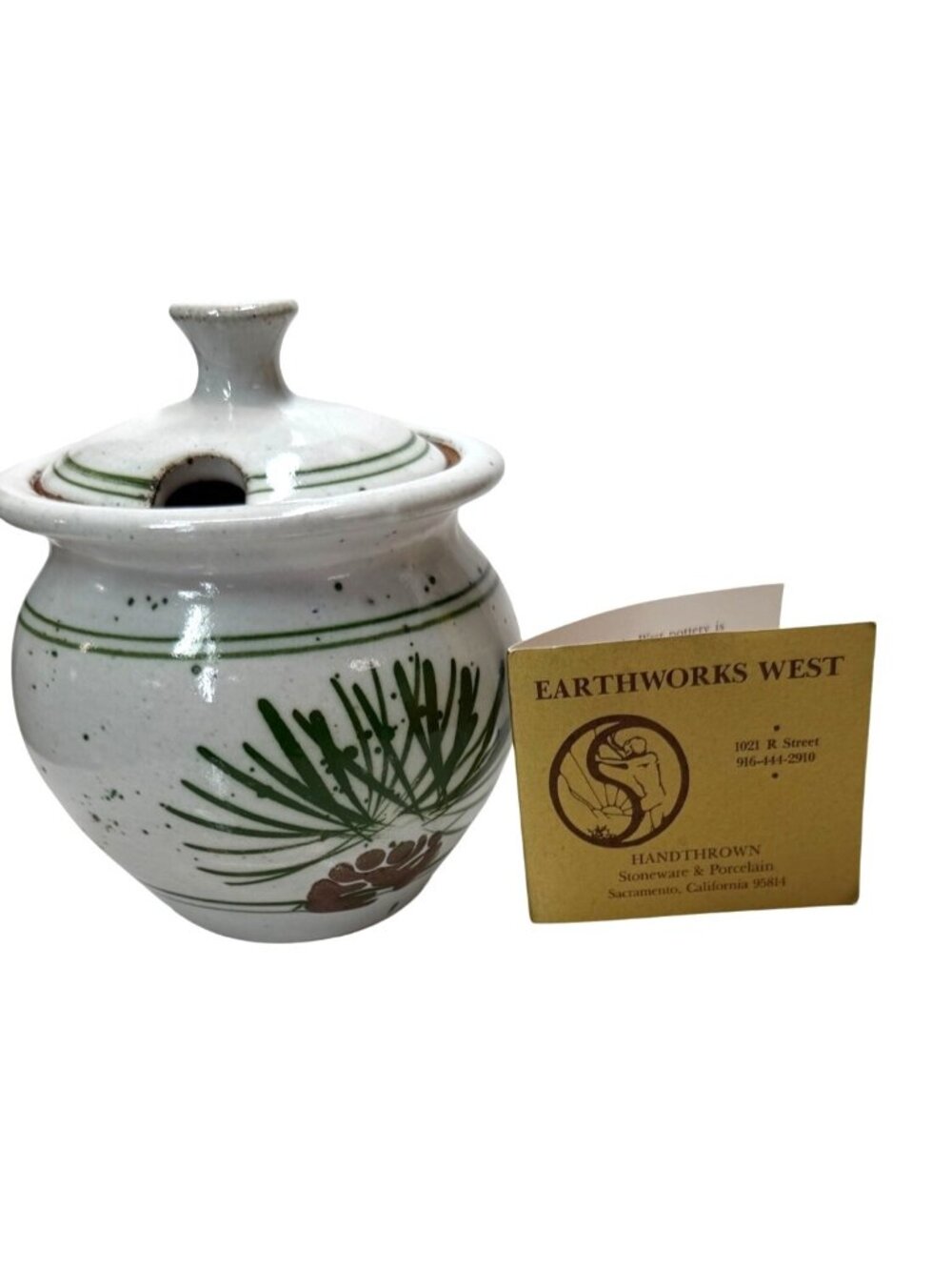 Vintage Earthworks West Pottery lidded jar featuring a speckled white glaze with